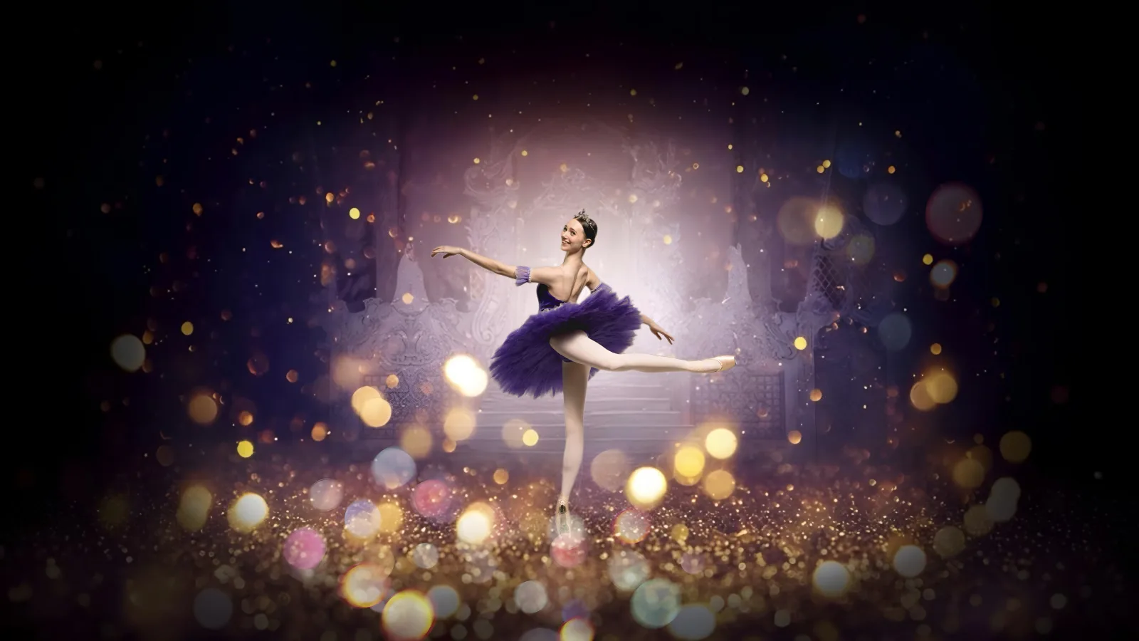 Ballerina in a purple tutu performing in a glowing Nutcracker scene